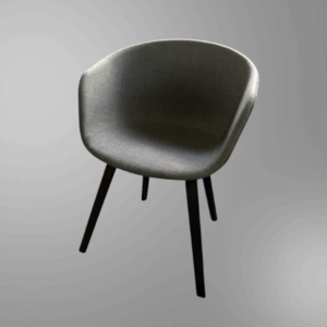 Grey bucket side chair in a grey photo background