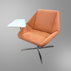 A used Arcadia Nios swivel lounge chair with a tablet surface for notebooks, laptops.
