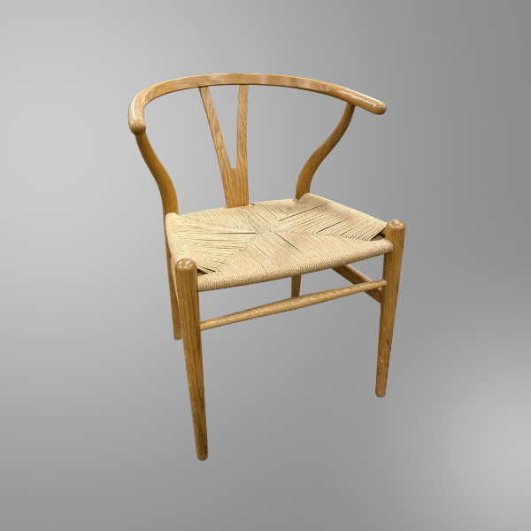 A used Carl Hansen CH24 Wishbone chair in light honey available at Office Furniture Resources.