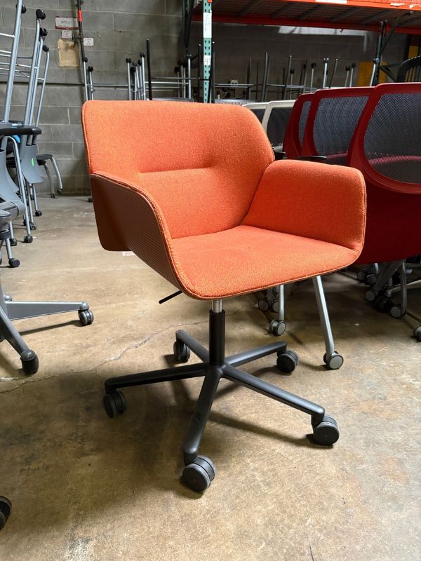 Side view: Used Andreu World Nuez Swivel Guest Chair